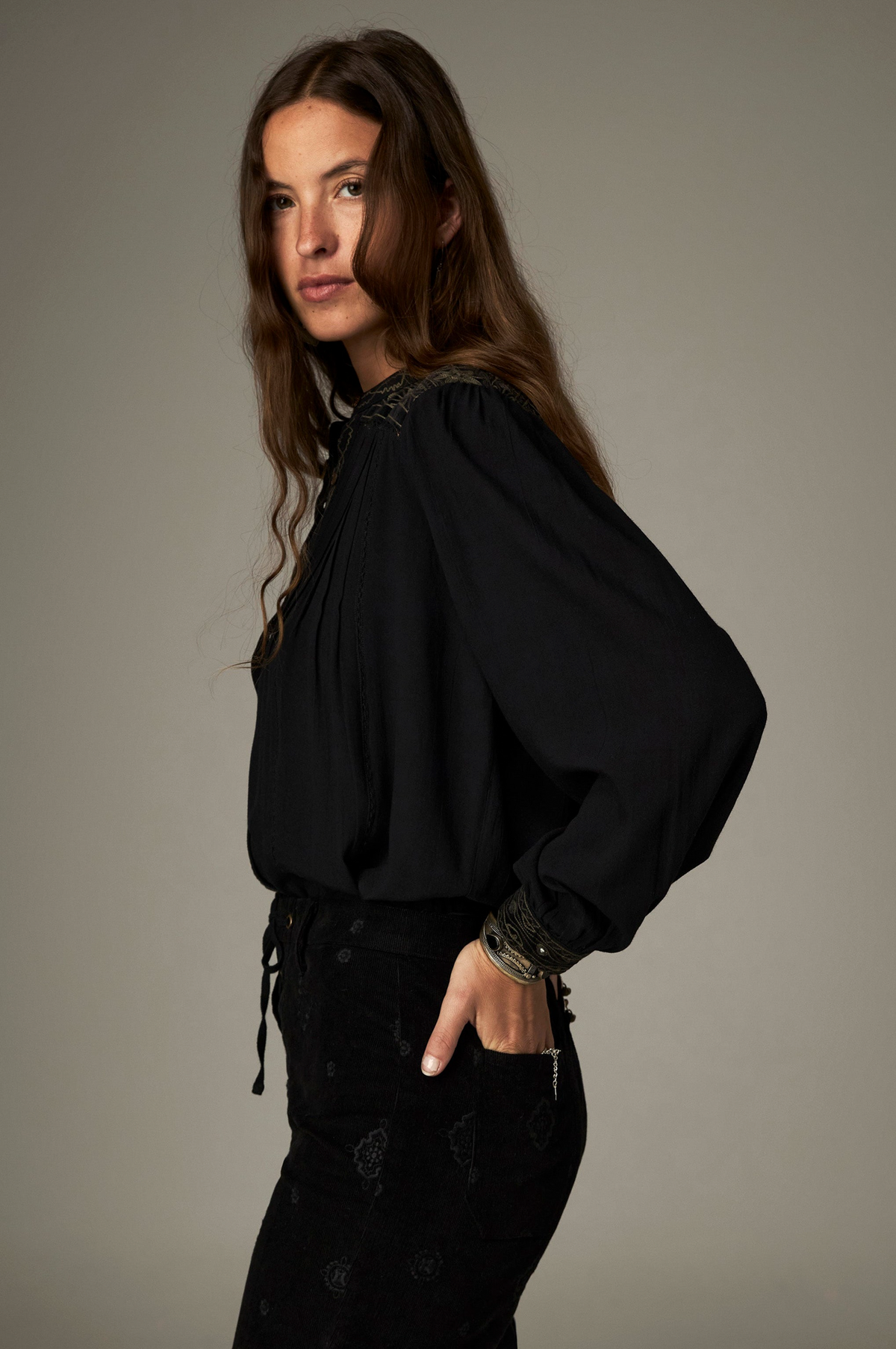 Marie Blouse in Onix, a Tencel crepe blouse with band collar, contrasting embroidery on the yokes and cuffs and mirror details