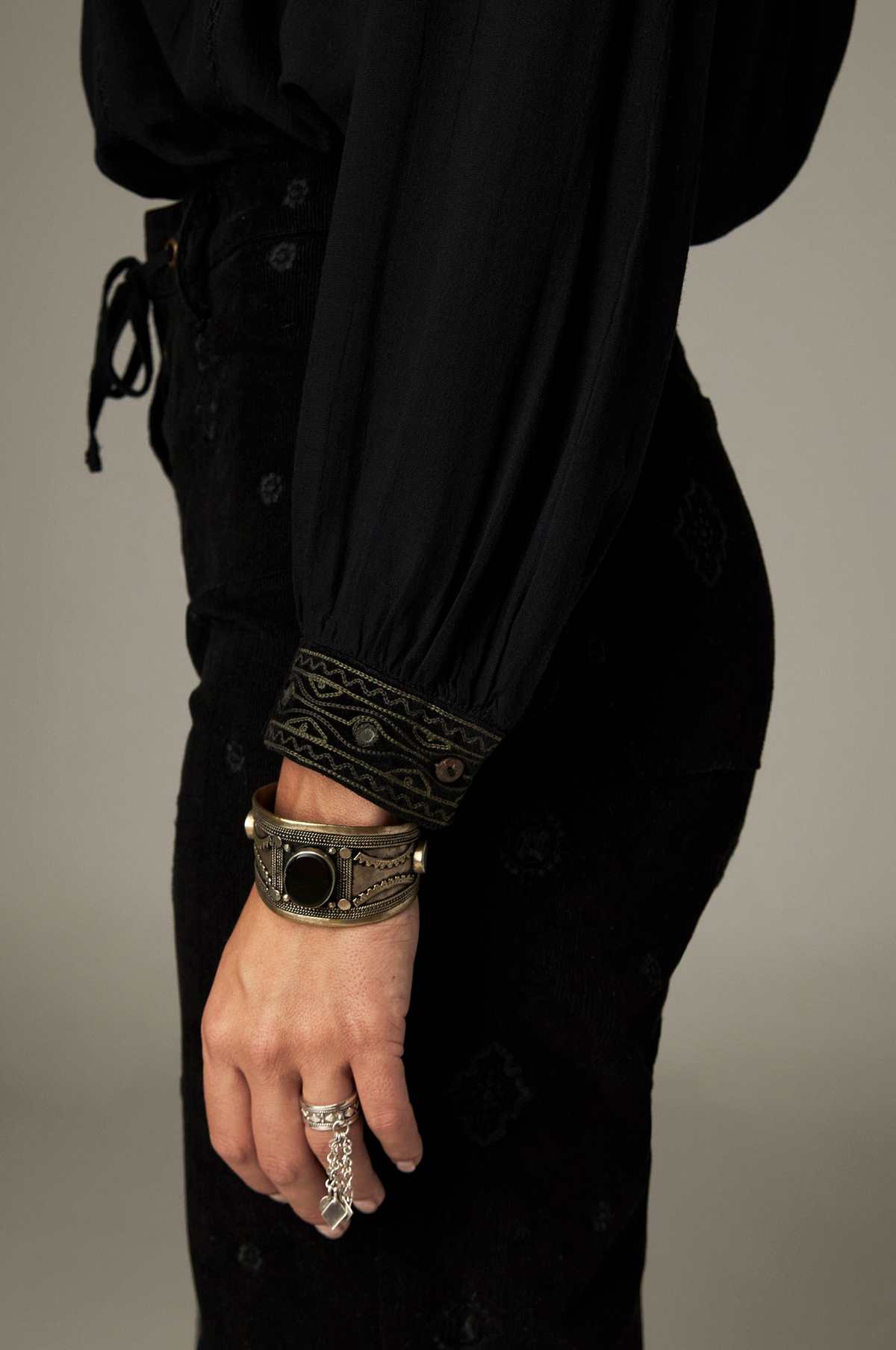 Marie Blouse in Onix, a Tencel crepe blouse with band collar, contrasting embroidery on the yokes and cuffs and mirror details