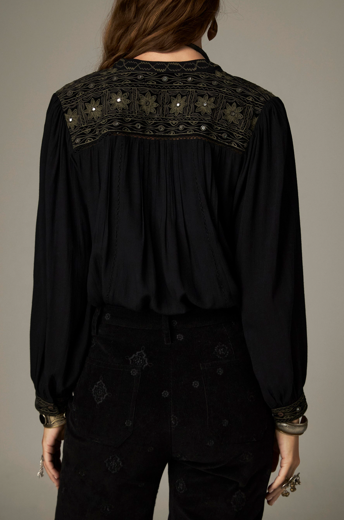 Marie Blouse in Onix, a Tencel crepe blouse with band collar, contrasting embroidery on the yokes and cuffs and mirror details