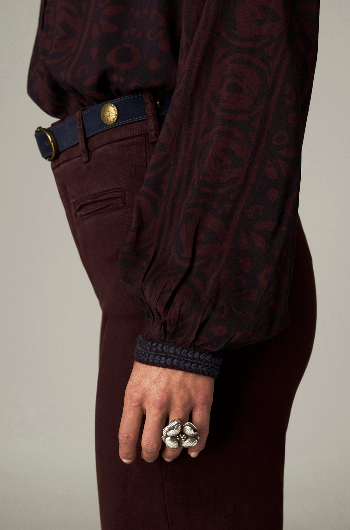 Marie Blouse in Muddy Waters, a printed modal blouse with band collar, contrasting embroidery and mirror details