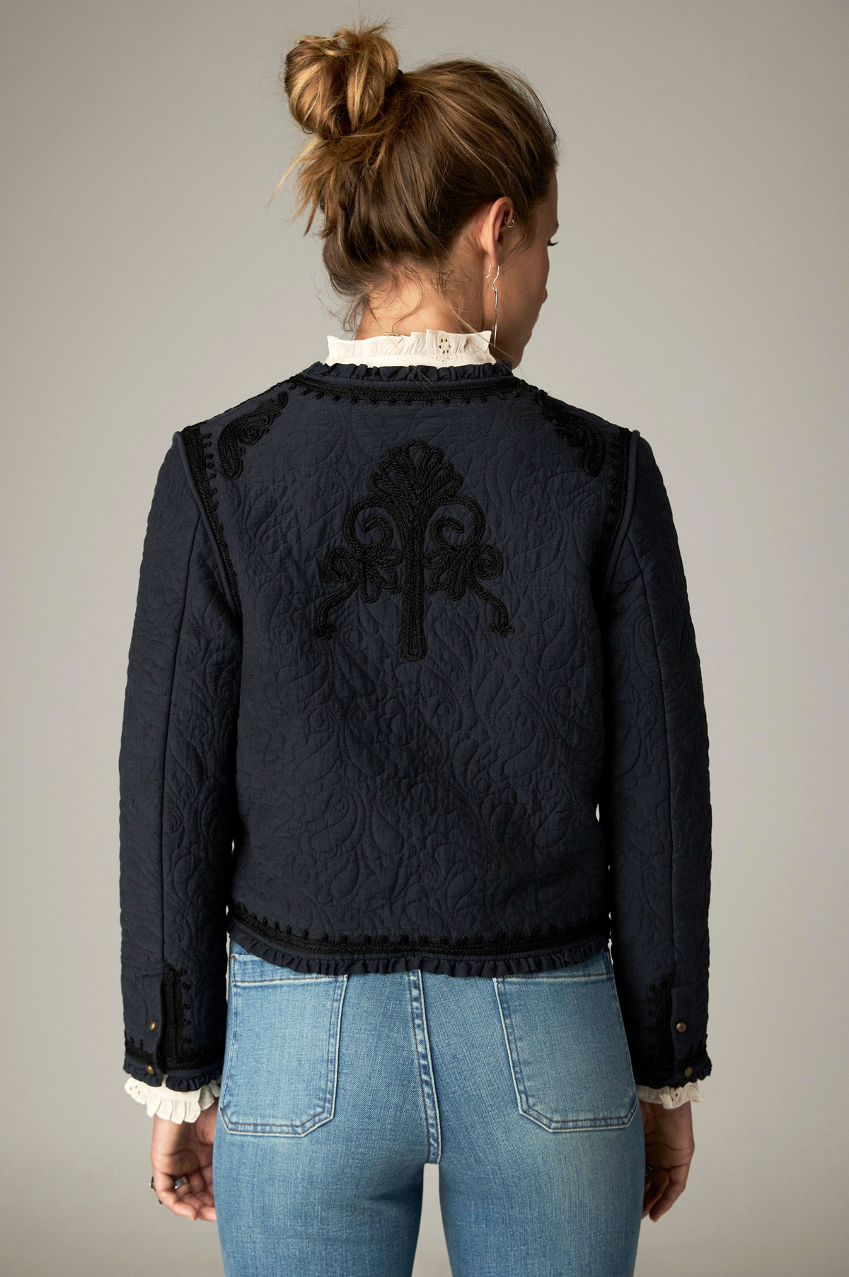 Paco Jacket in Ceniza, a cropped collarless viscose voile jacket with open front, embroidered trim and patch pockets